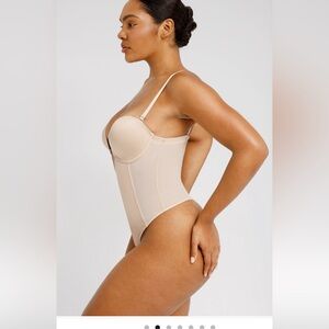 Shapellx AirSlim Deep Plunge Low-Back Thong Bodysuit
Size medium Beige Bodysuit